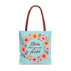 Colorful floral tote bag with the quote 'Bloom Where You Are Planted' available in three sizes