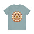 A close-up image of the Intricate Mandala Tee in brown and orange, showcasing the intricate mandala design and vibrant color combination