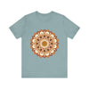 A close-up image of the Intricate Mandala Tee in brown and orange, showcasing the intricate mandala design and vibrant color combination