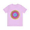 Close up image of a vibrant mandala tee, with intricate and colorful design