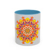 A close-up image of a vibrant mandala mug featuring colorful and intricate art designs
