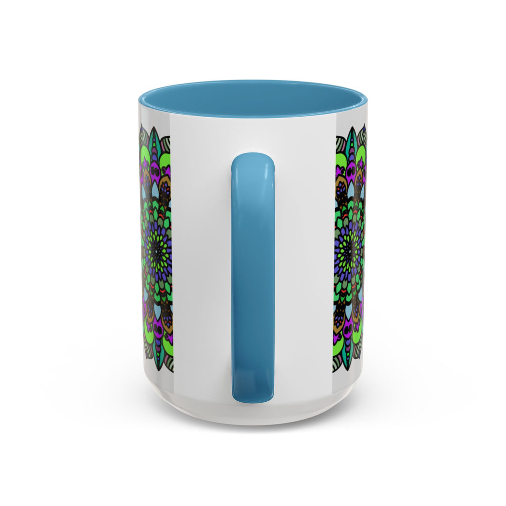 Colorful and intricate mandala art design on white ceramic mug