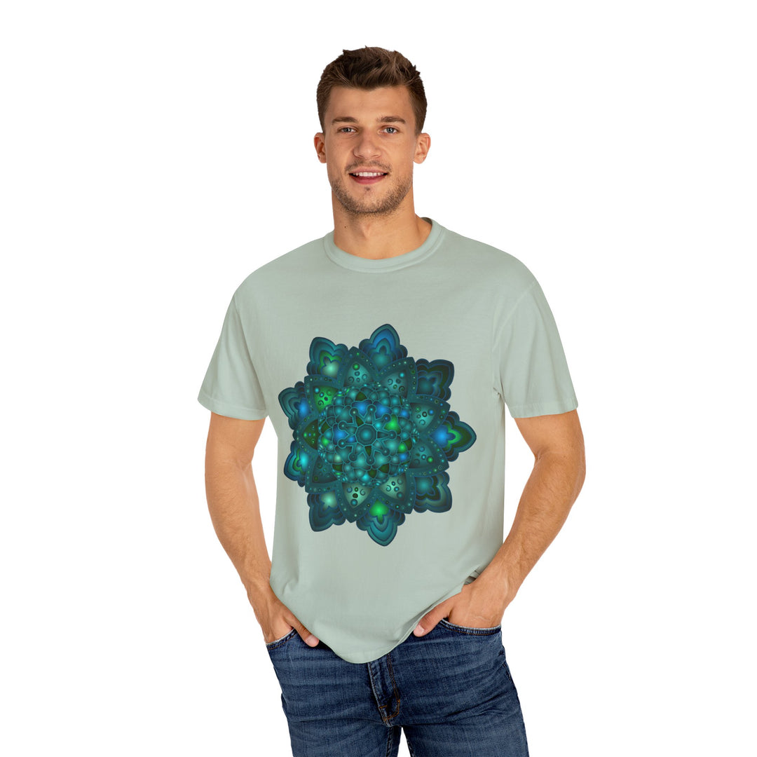 A beautiful unisex t-shirt featuring an intricate blue and green mandala design