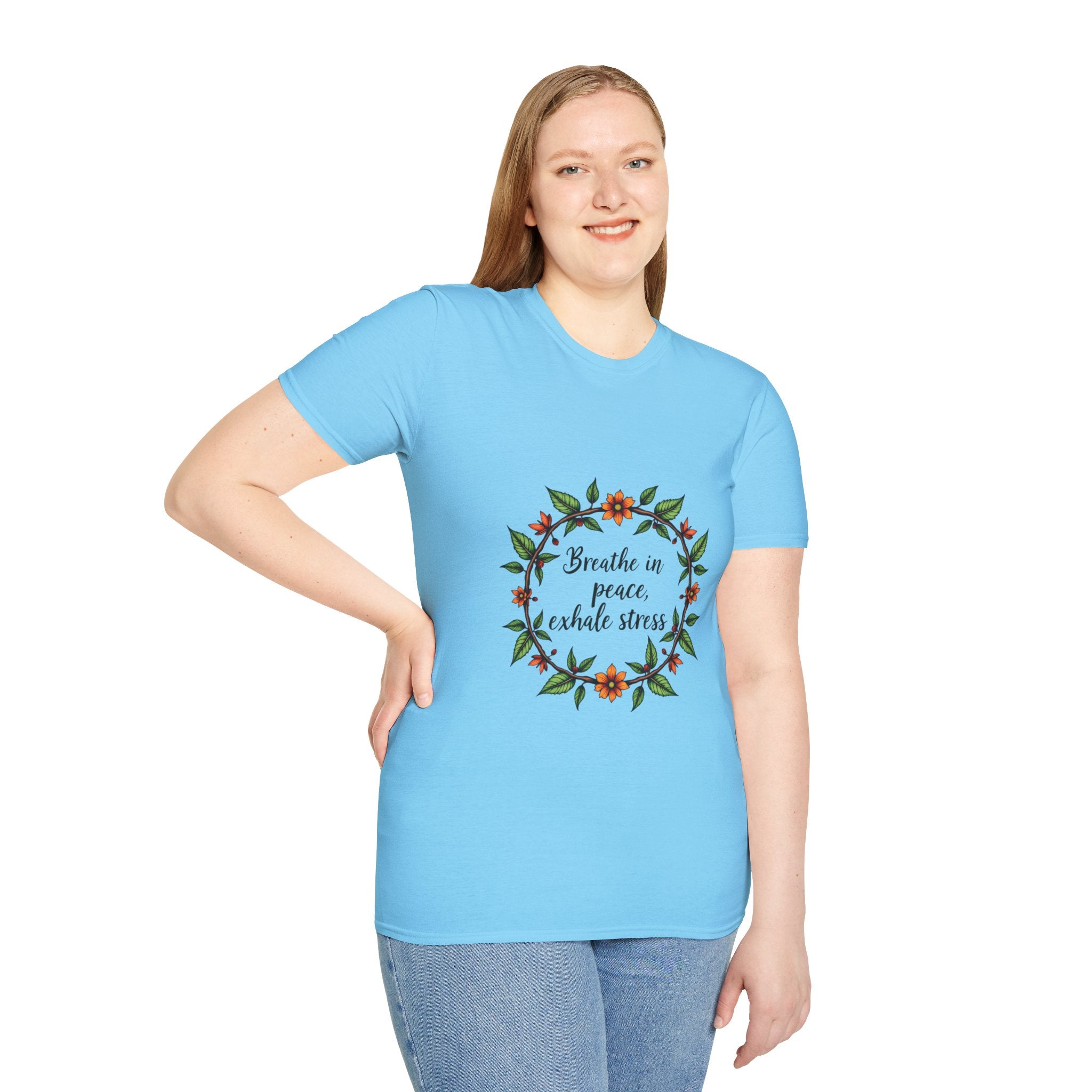 A soft cotton t-shirt with a beautiful floral garland design, featuring the quote Breathe in Peace Exhale Stress in a calming script font