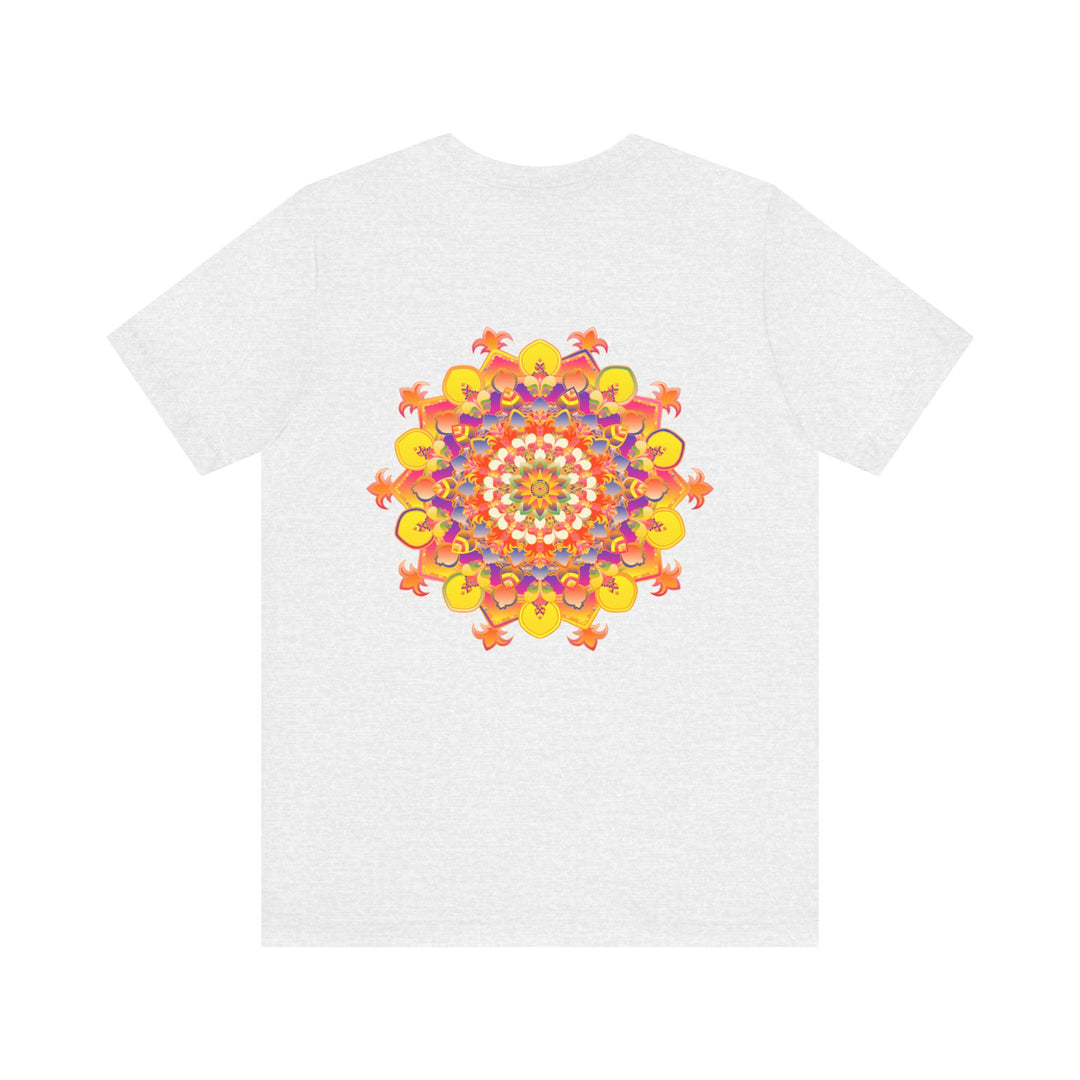 A person wearing the Vibrant Mandala Tee while engaging in yoga, finding inner peace and strength