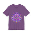 A stylish purple and gold mandala tee featuring intricate spiritual art designs