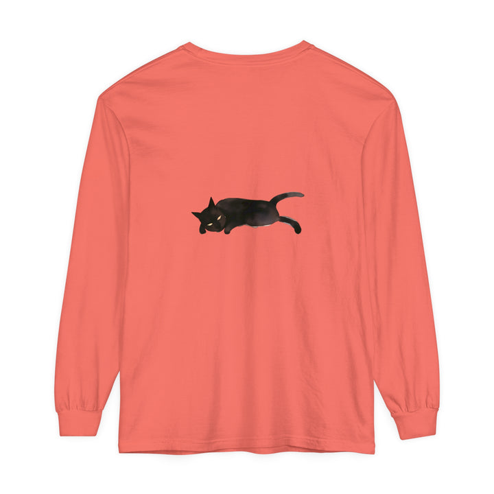 A cozy unisex long sleeve t-shirt featuring a cute sleeping black cat design