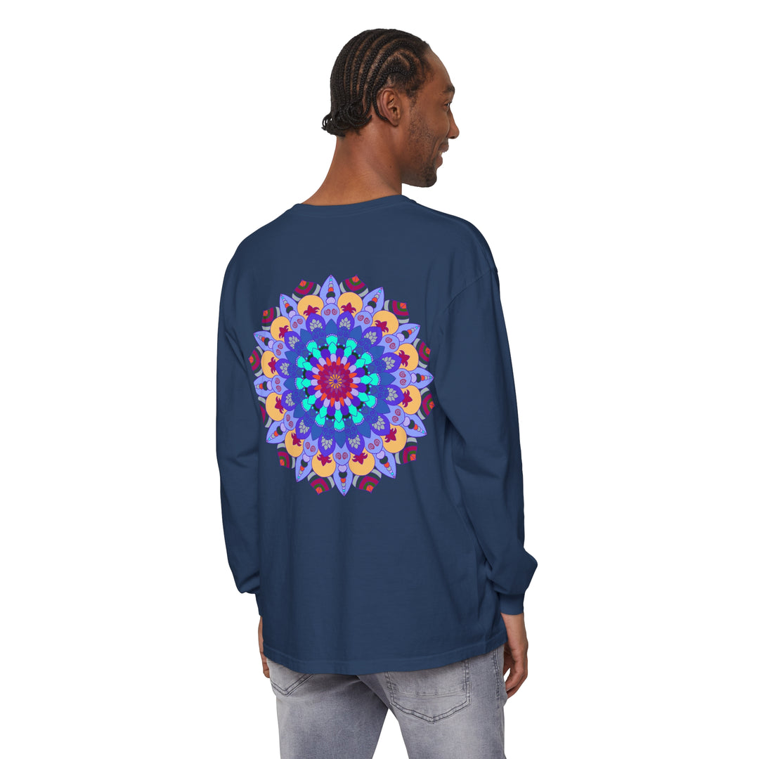 A close-up image of a long sleeve T-shirt featuring a vibrant and colorful mandala design