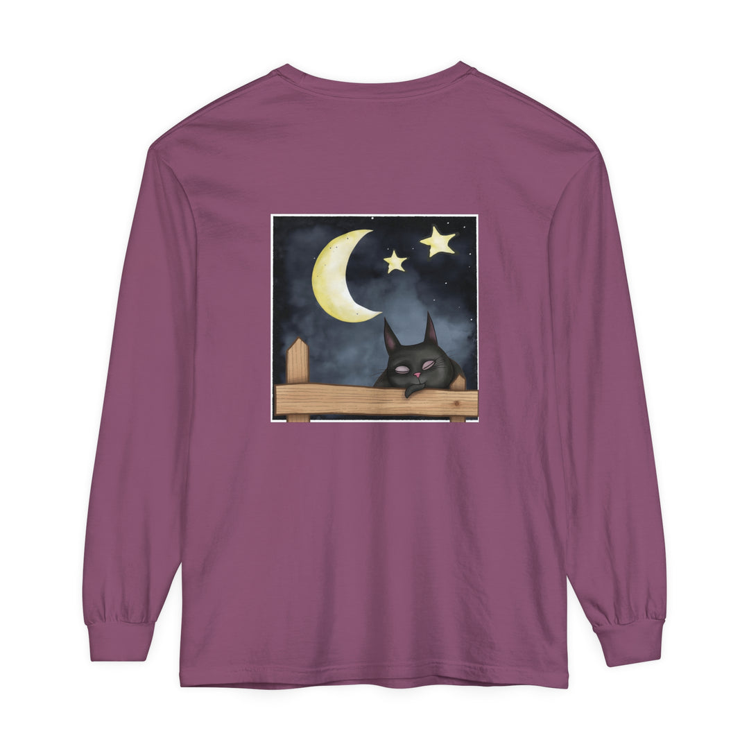 A comfortable black t-shirt featuring a sleepy cat under the night sky