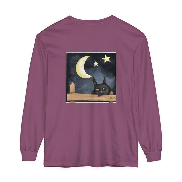 A comfortable black t-shirt featuring a sleepy cat under the night sky