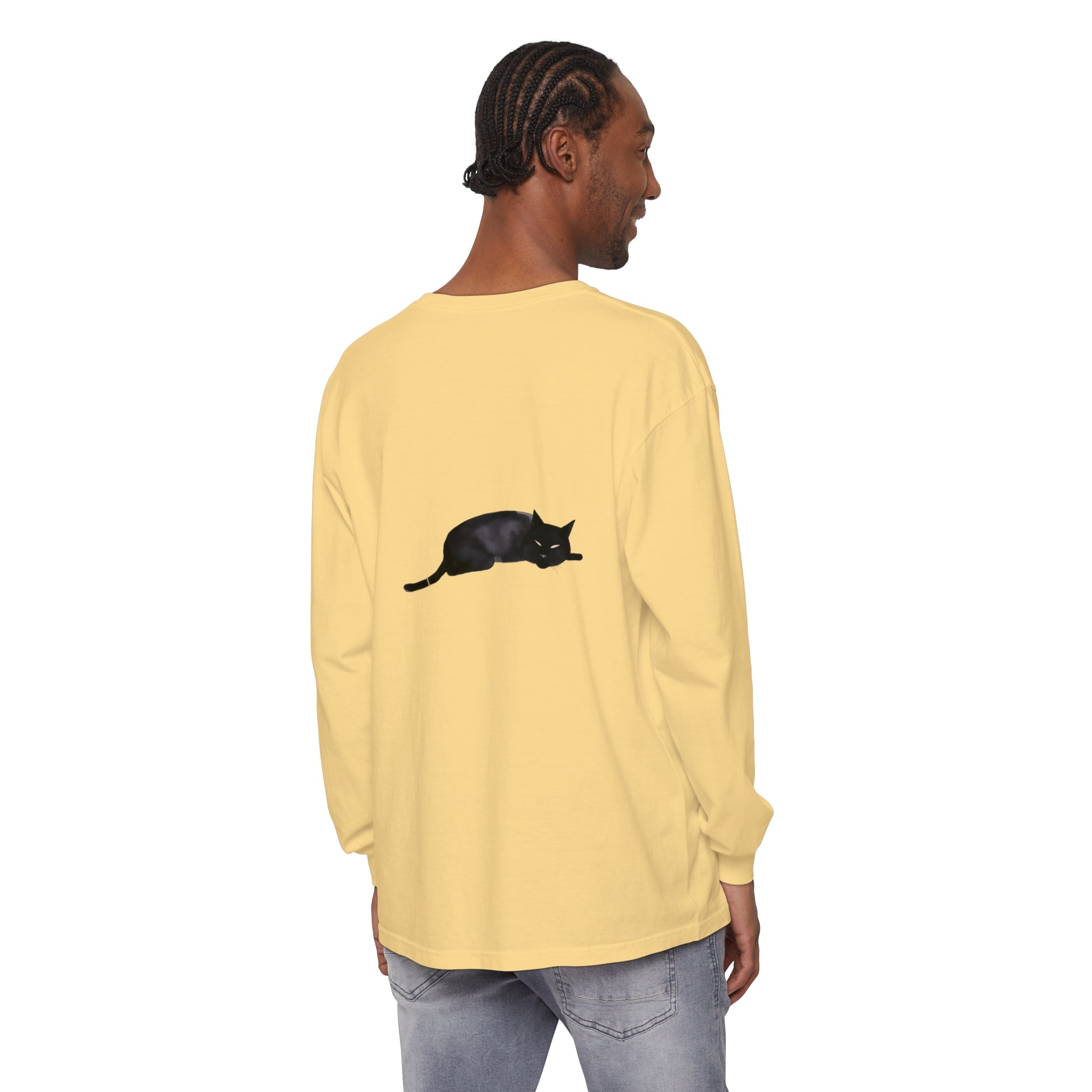 A black cat with closed eyes sleeping on a unisex long sleeve T-shirt