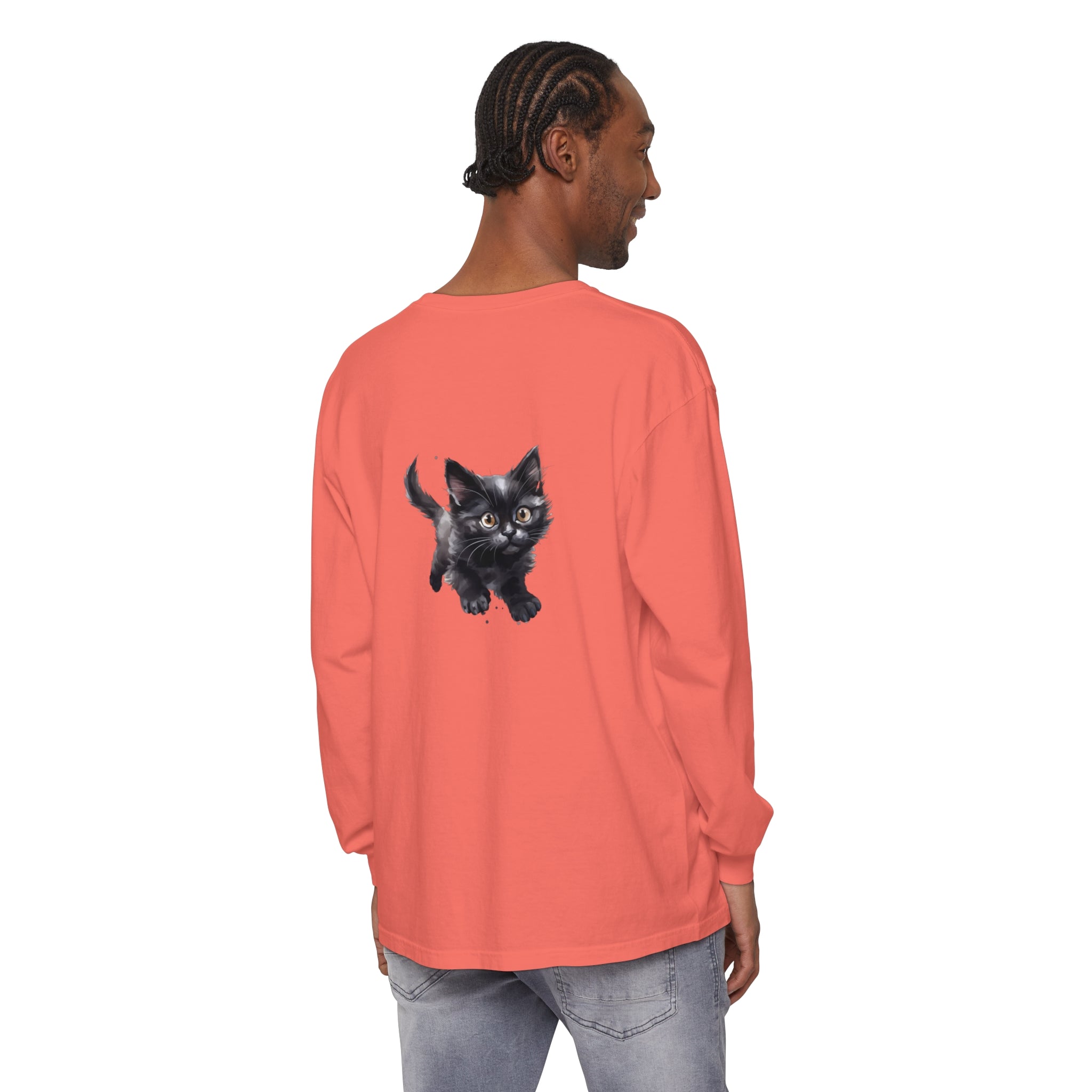 A watercolor illustration of a playful kitten printed on a t-shirt