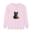A vibrant and playful watercolor splash design featuring a black kitten on a high-quality t-shirt