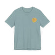 A vibrant and colorful mandala tee shirt, featuring intricate patterns symbolizing spiritual peace and harmony