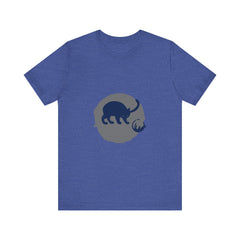 A black cat with glowing yellow eyes and a mischievous expression in a playful silhouette against a moonlit background, featured on a mystery-themed t-shirt