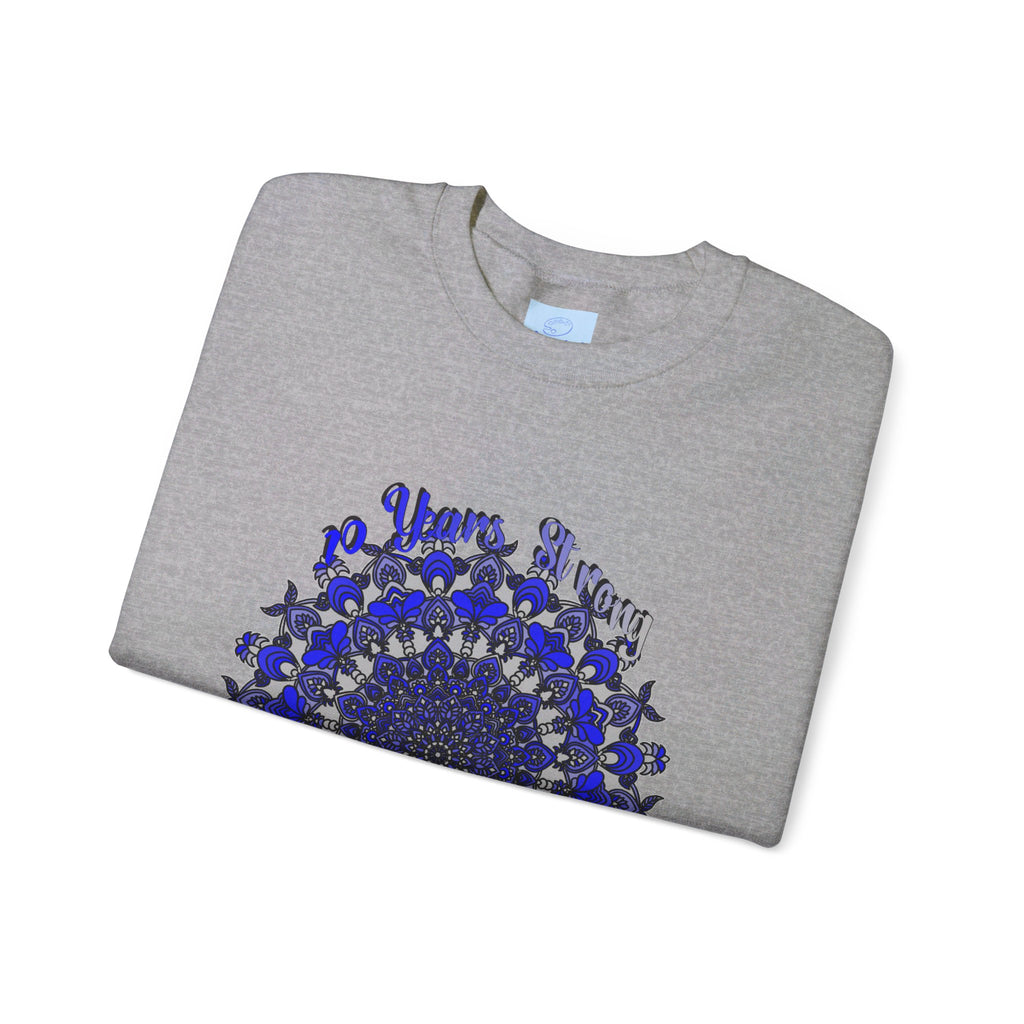 Royal blue sweatshirt with 10th Anniversary insignia