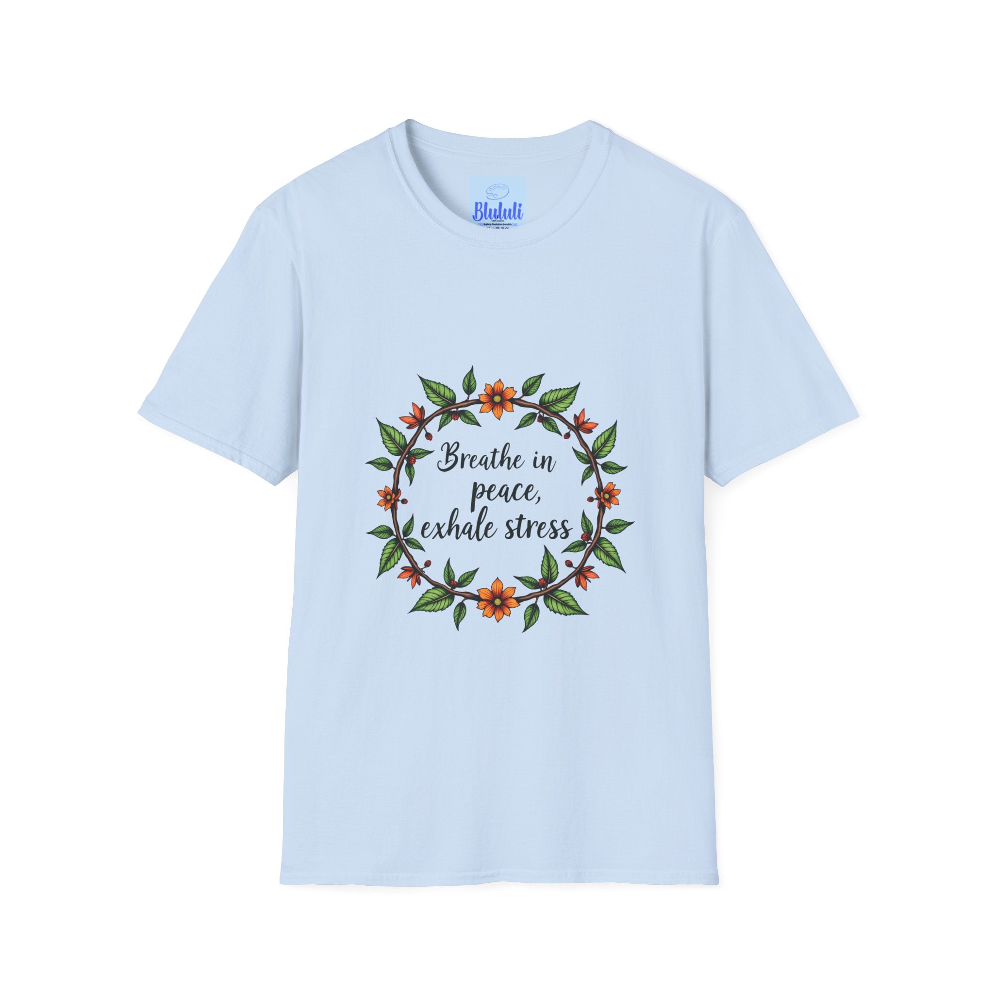 White t-shirt with a floral garland design and the text 'Breathe in Peace Exhale Stress', perfect for a peaceful and stylish wardrobe addition