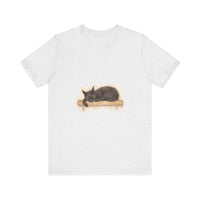 A close-up of a black cat with closed eyes, sleeping peacefully, in a watercolor style, printed on a comfortable t-shirt