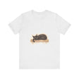 A close-up of a black cat with closed eyes, sleeping peacefully, in a watercolor style, printed on a comfortable t-shirt