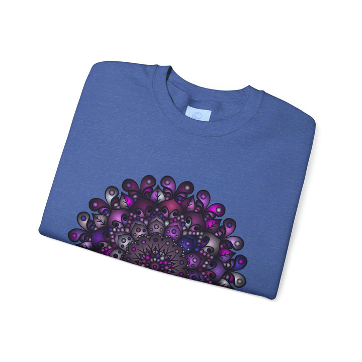 A cozy, versatile Unisex Heavy Blend Crewneck Sweatshirt in purple with intricate mandala design