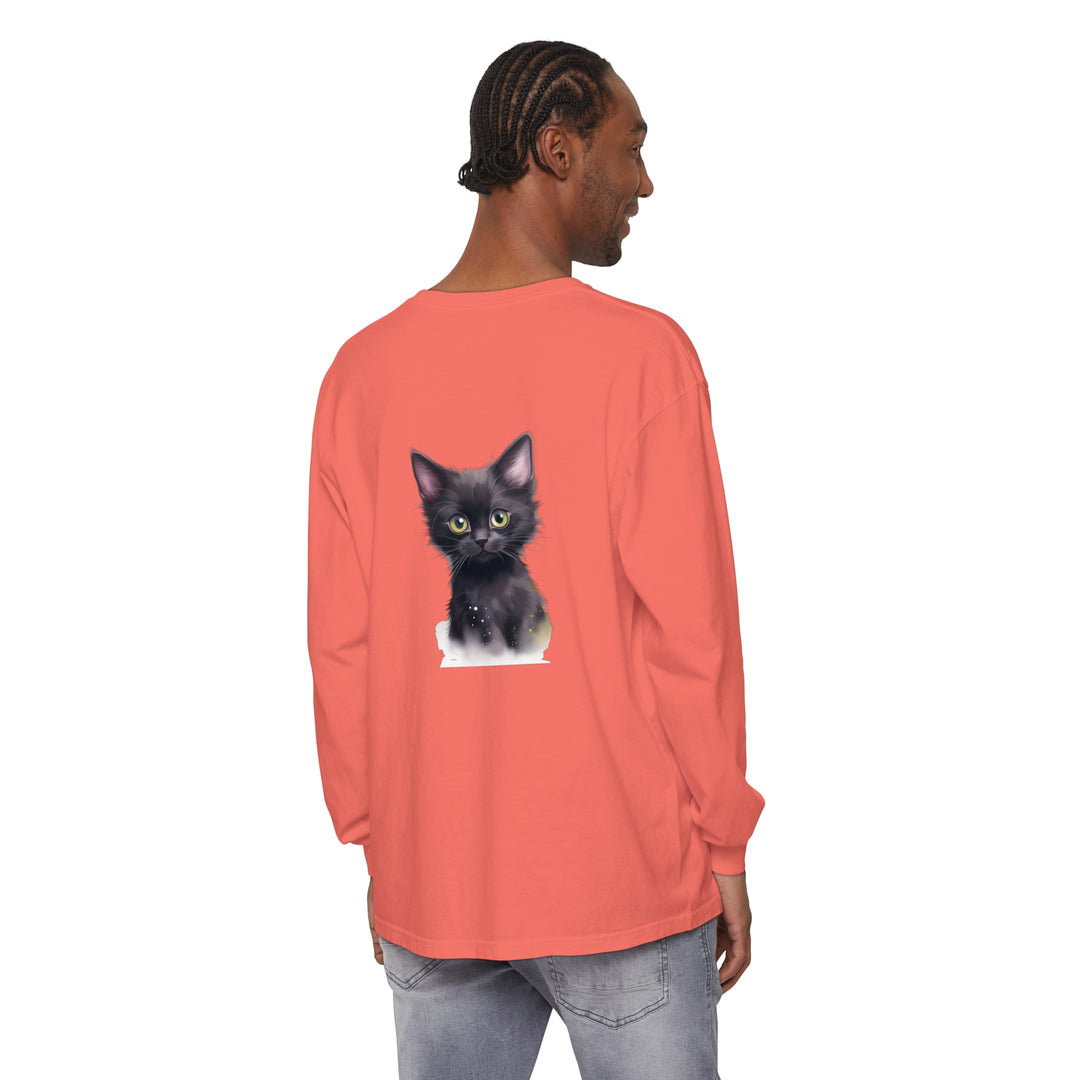 A high-quality black t-shirt featuring an adorable black kitten with striking green eyes