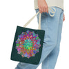 Dark green tote bag with intricate and colorful mandala design, perfect for carrying all your essentials in style