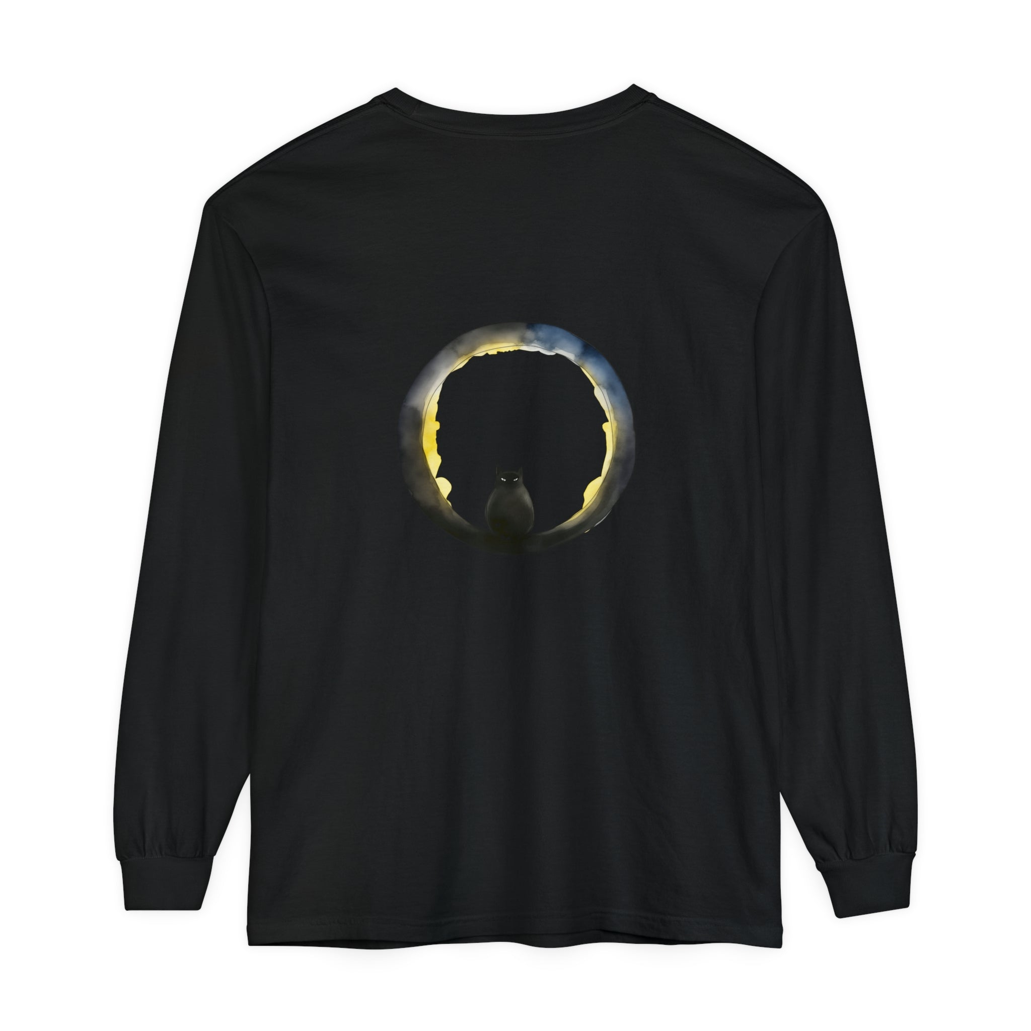 A spooky Halloween t-shirt featuring a black cat sitting within a crescent moon design