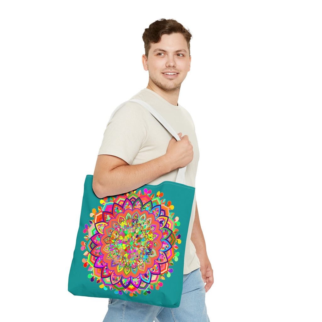 Beautiful aquamarine tote bag featuring a colorful mandala art design