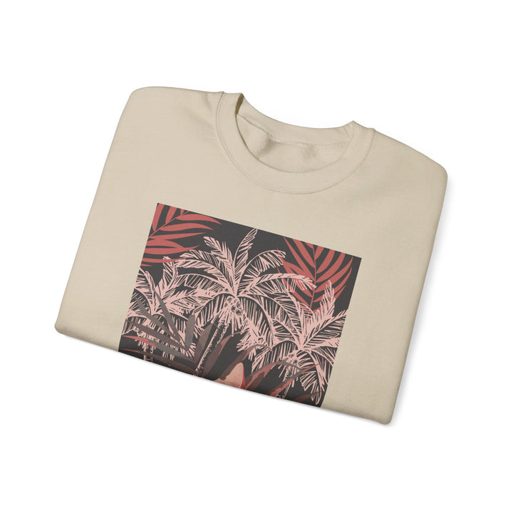 A cozy and stylish unisex heavy blend crewneck sweatshirt featuring a cat relaxing under palm trees design