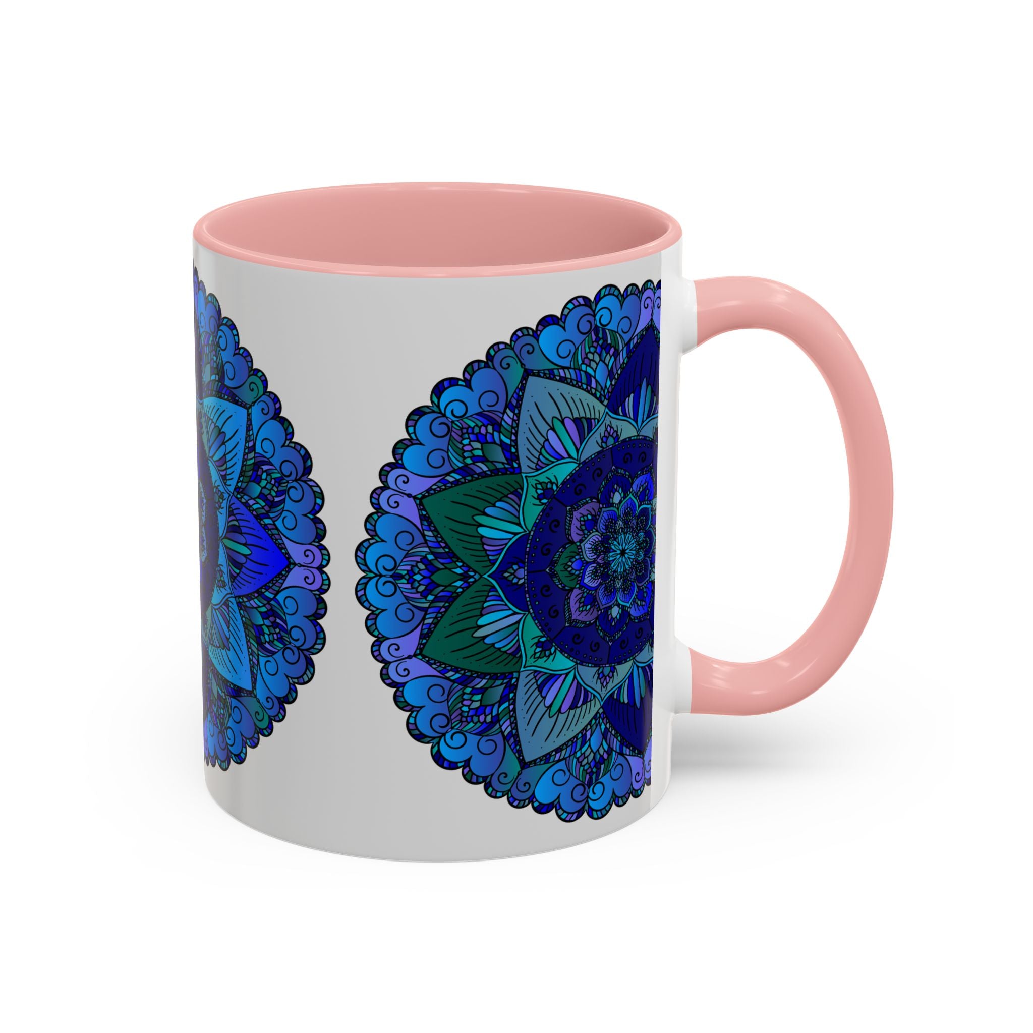 A handmade ceramic mug with a blue and purple mandala design, inspired by bohemian art