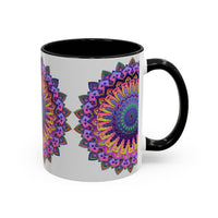 A grey ceramic mug featuring a vibrant mandala art design