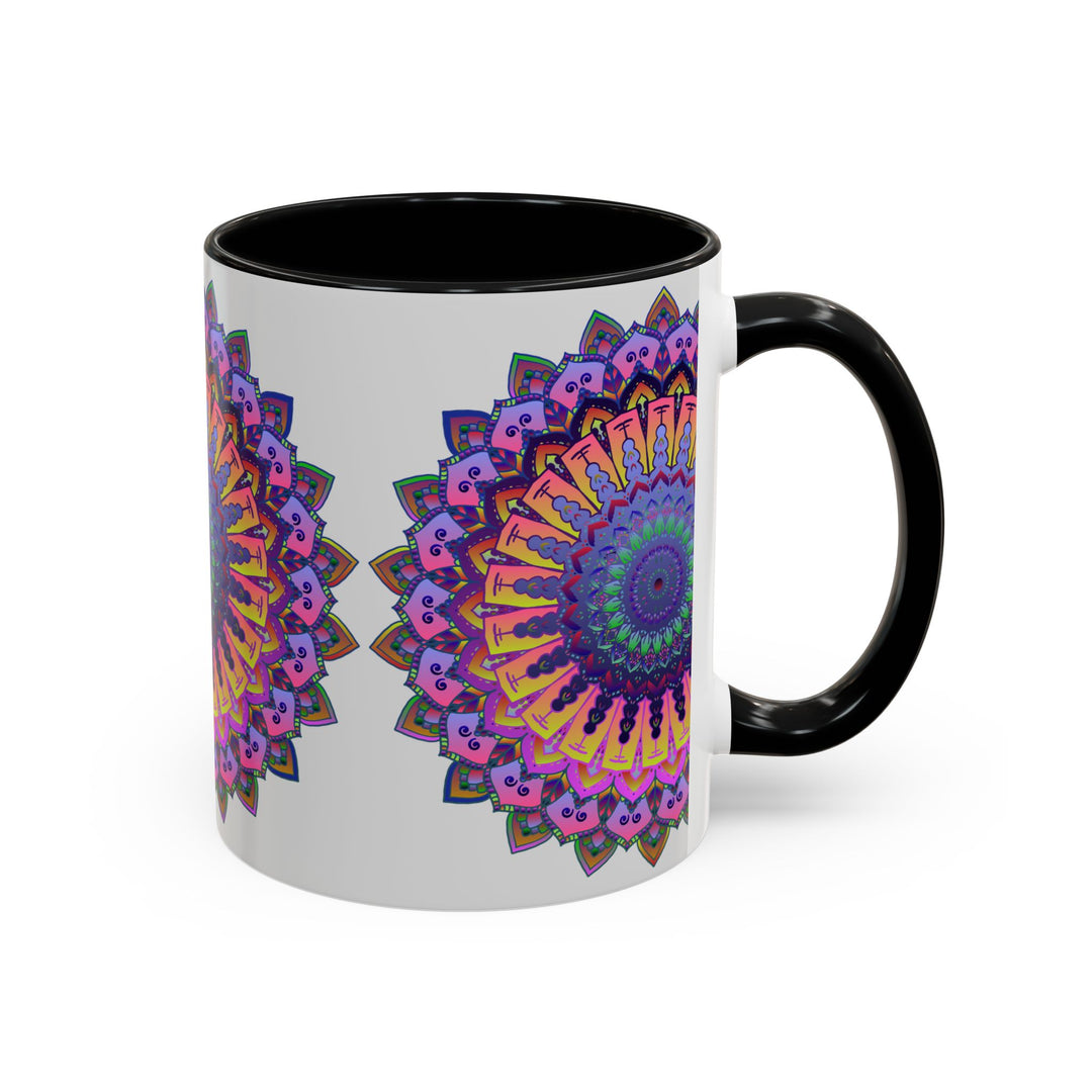 A grey ceramic mug featuring a vibrant mandala art design