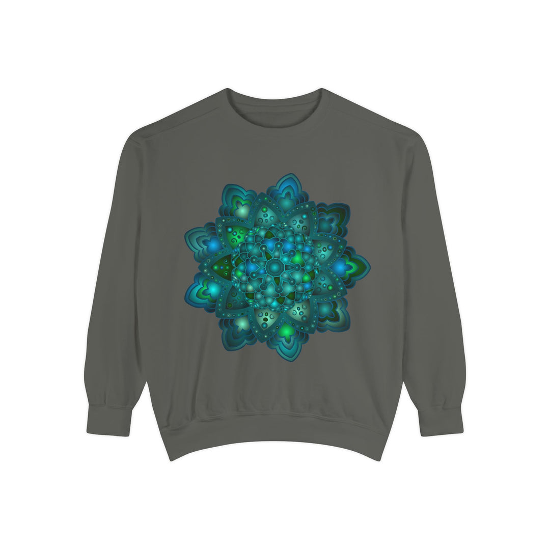 A close-up image of a comfortable and stylish blue and green mandala sweatshirt with intricate and detailed patterns