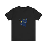 A black cat with green eyes and a mischievous expression, wearing a playful and cute mystery-themed t-shirt