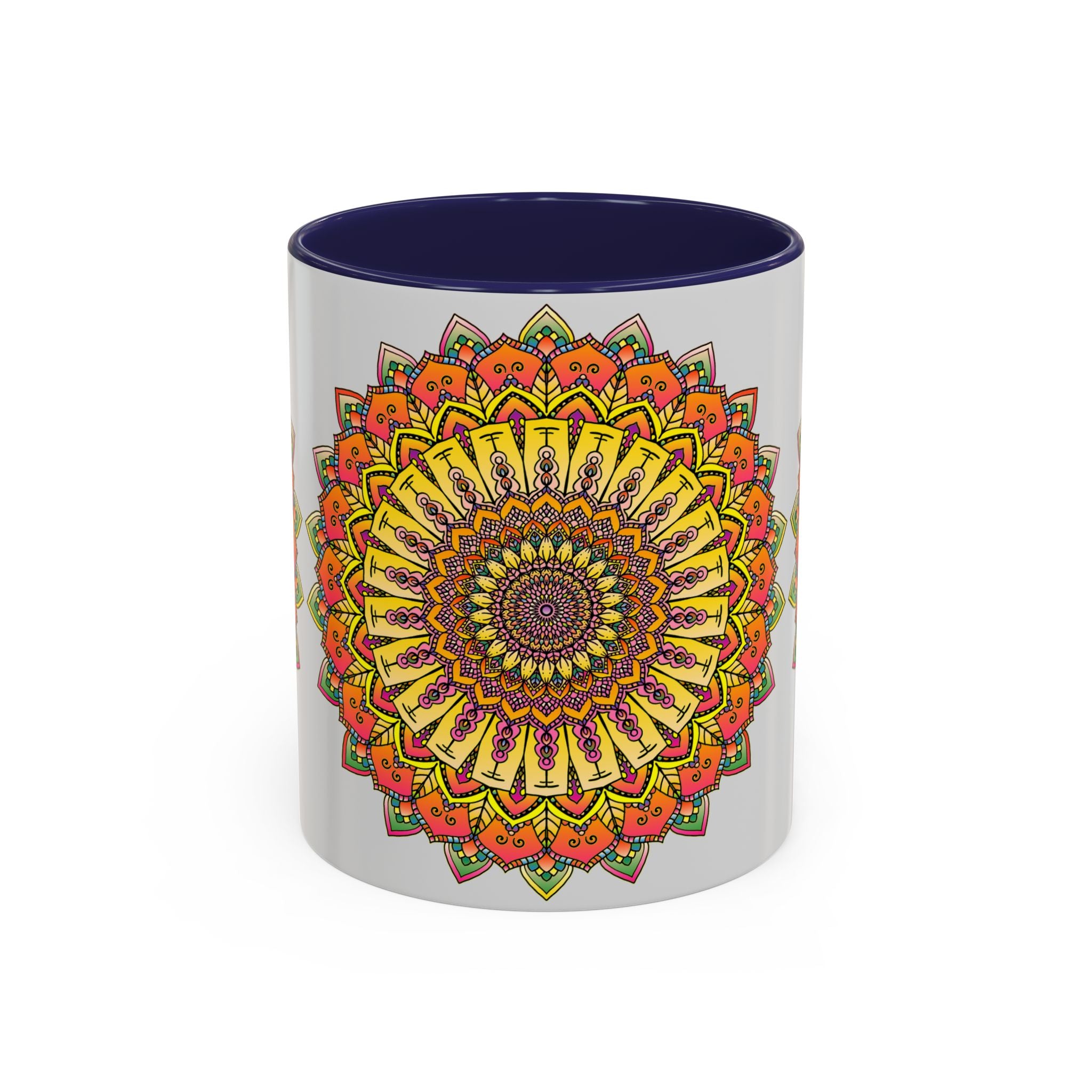 A grey mug with a vibrant mandala design in various colors