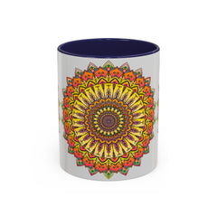 A grey mug with a vibrant mandala design in various colors