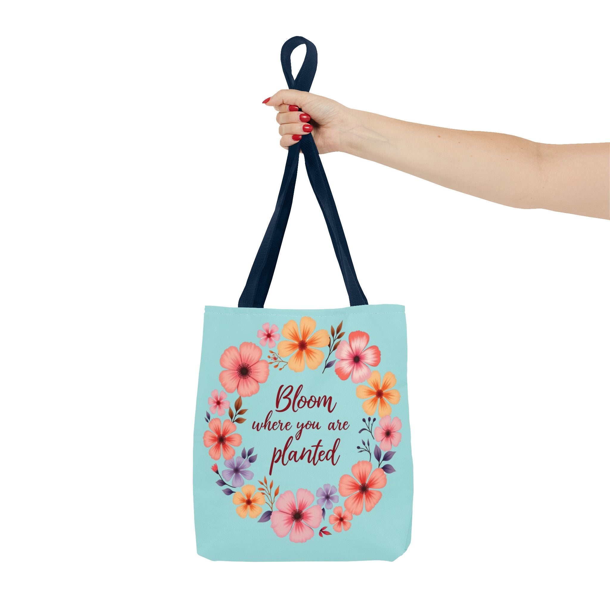 A beautifully designed floral tote bag with the quote Bloom Where You Are Planted available in 3 different sizes