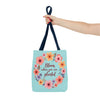 A beautifully designed floral tote bag with the quote Bloom Where You Are Planted available in 3 different sizes