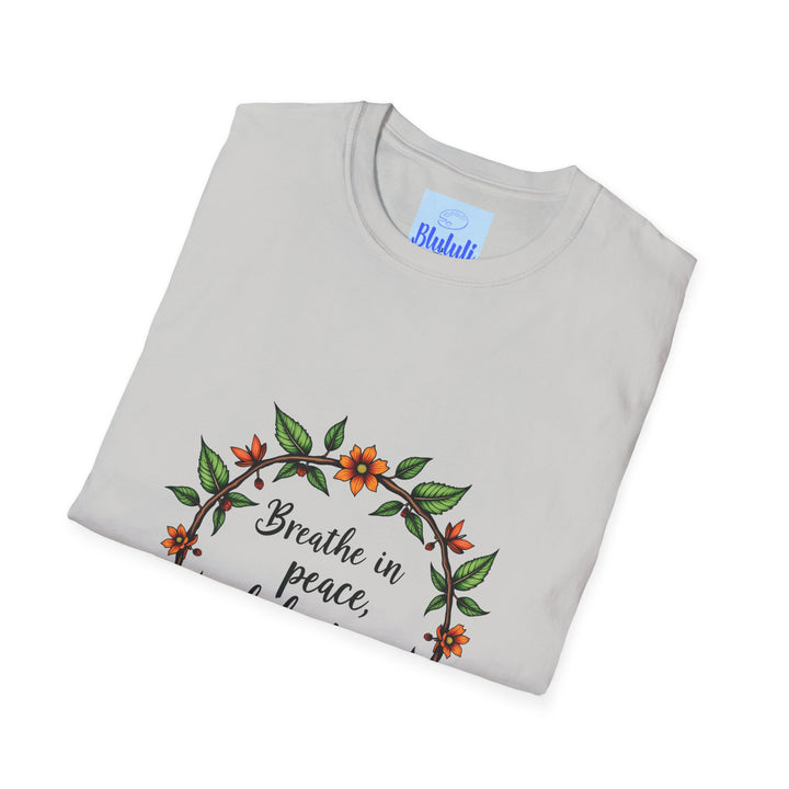 Beautiful white t-shirt featuring a floral garland design and the text 'Breathe in Peace Exhale Stress', perfect for relaxation and tranquility