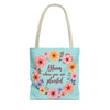 Stylish and versatile floral tote bag with the empowering quote 'Bloom Where You Are Planted' available in 3 different sizes