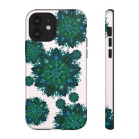 Beautiful light pink and green mandala phone case with a peaceful and intricate design