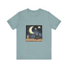 A cozy black t-shirt featuring a sleepy cat under a moonlit night