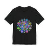 A close-up image of a colorful and intricately designed mandala t-shirt, featuring vibrant patterns and intricate art