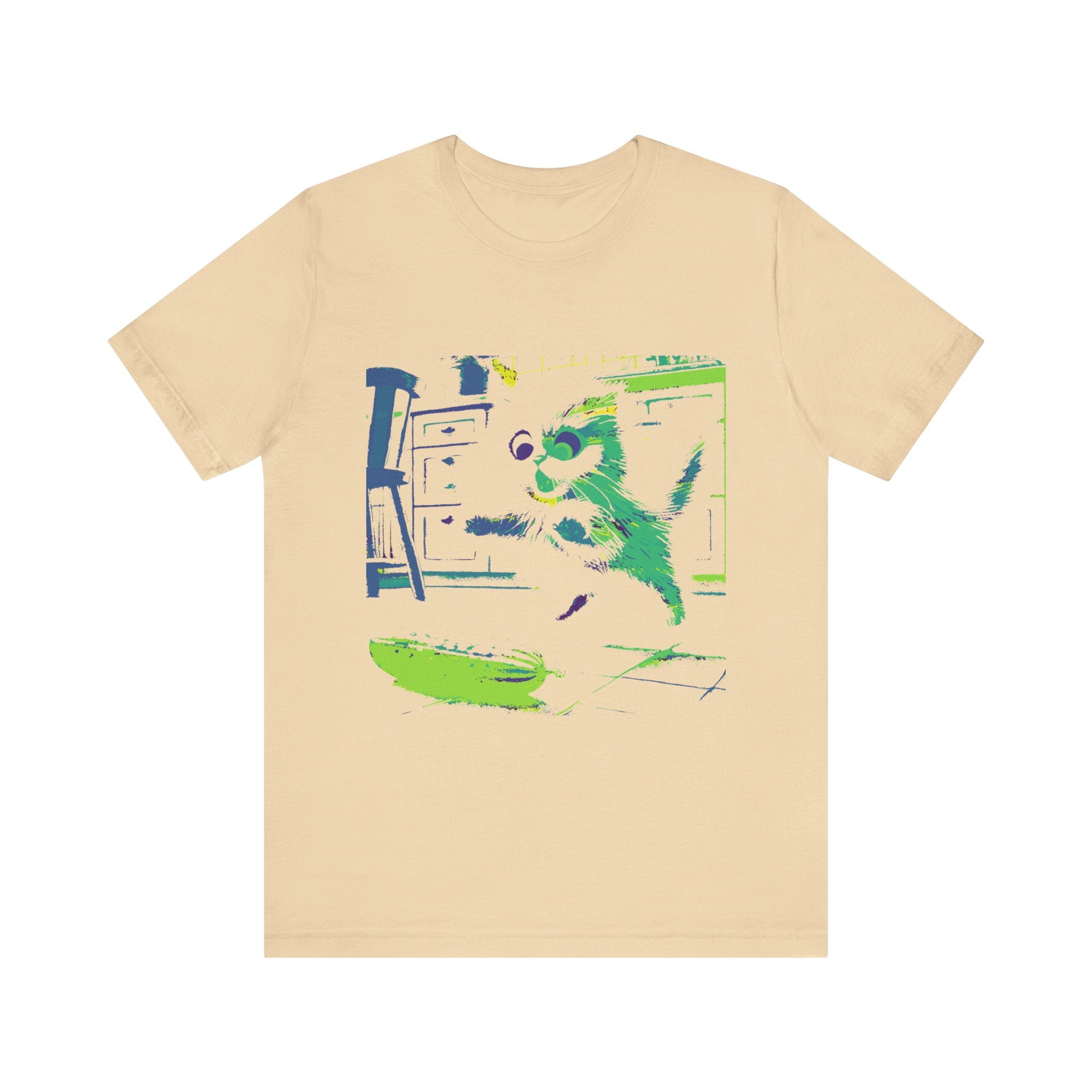 A black cat wearing a t-shirt jumps away in fear from a neon cucumber silhouette on the ground