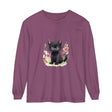 Adorable playful kitten surrounded by vibrant floral watercolor design on a comfortable t-shirt