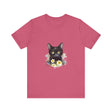 A close-up image of a black cat with piercing yellow eyes printed on a high-quality cotton t-shirt