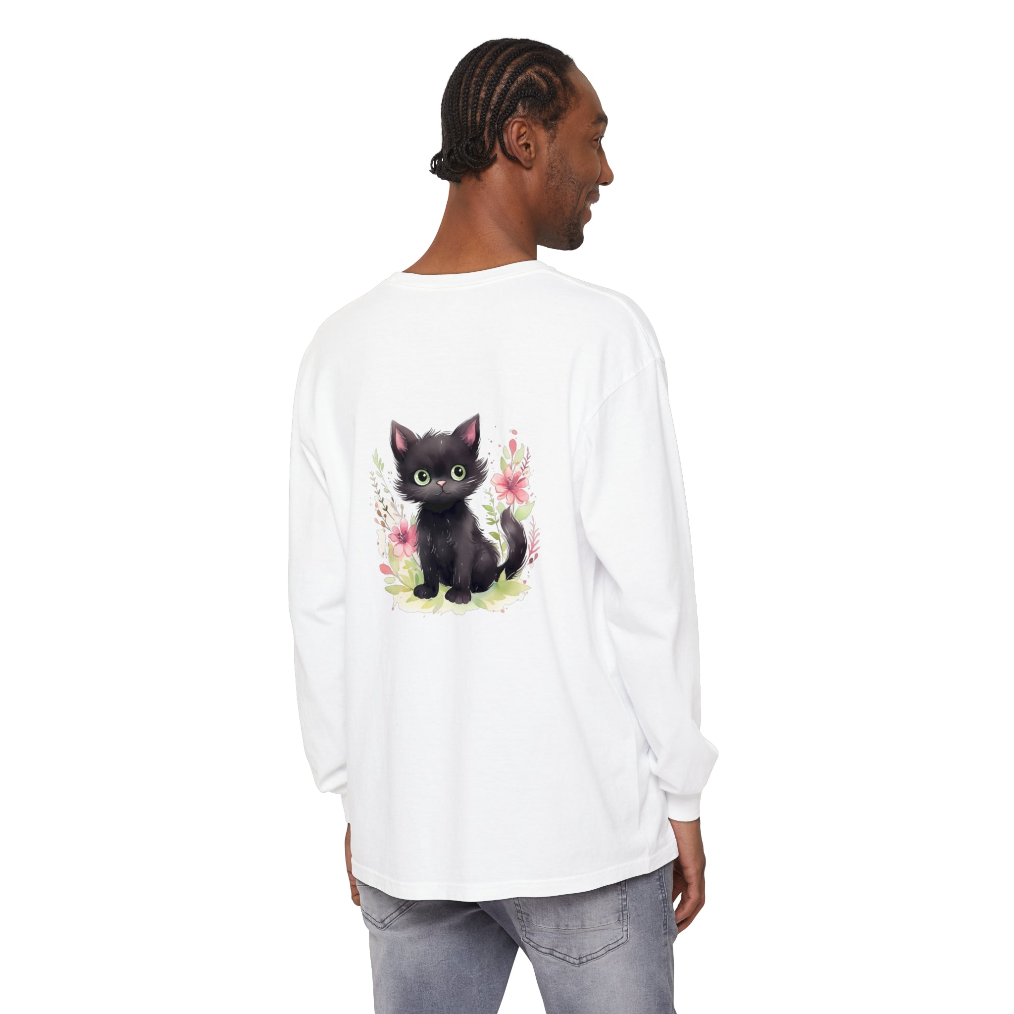 Adorable playful kitten surrounded by vibrant watercolor floral patterns on a stylish t-shirt