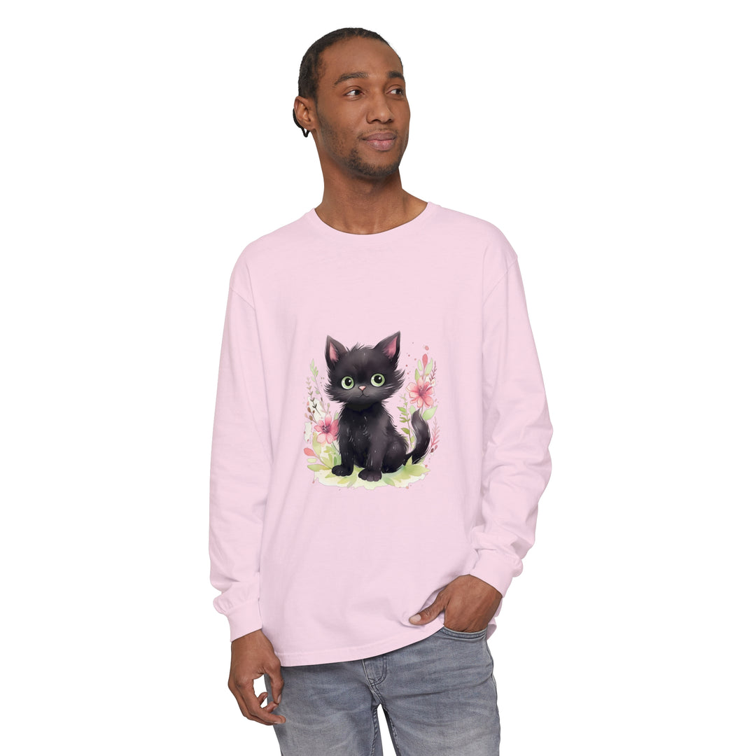 Adorable playful kitten surrounded by vibrant floral watercolor print on a t-shirt