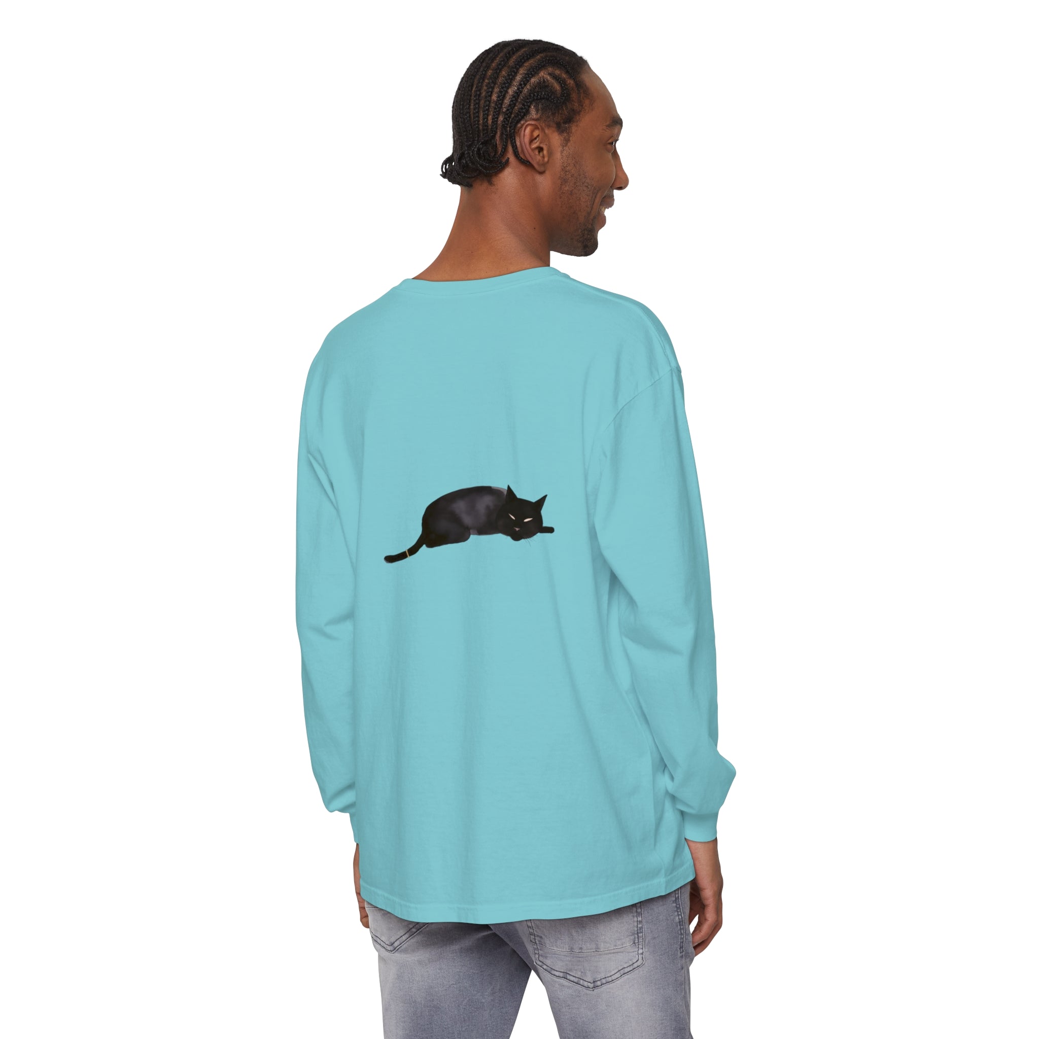 A black cat sleeping peacefully on a unisex long sleeve t-shirt