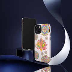 A light pink phone case with a mandala design featuring a beautiful lotus flower
